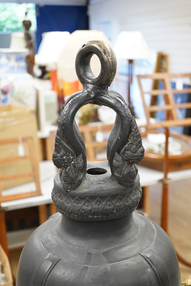A large 19th century Thai temple bell, 88cm high